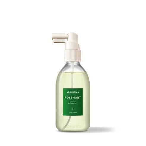 Rosemary scalp tonic sprayed onto scalp