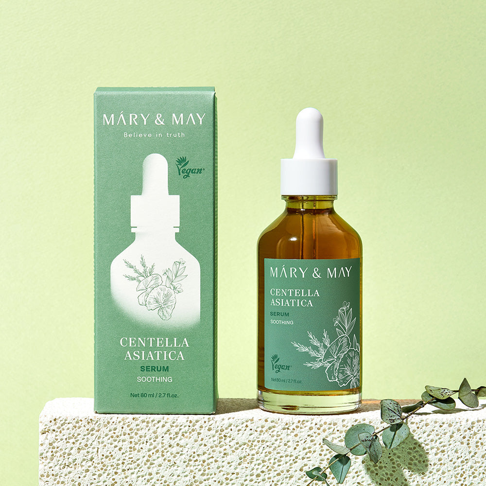 Serum being dispensed from pump bottle onto palm