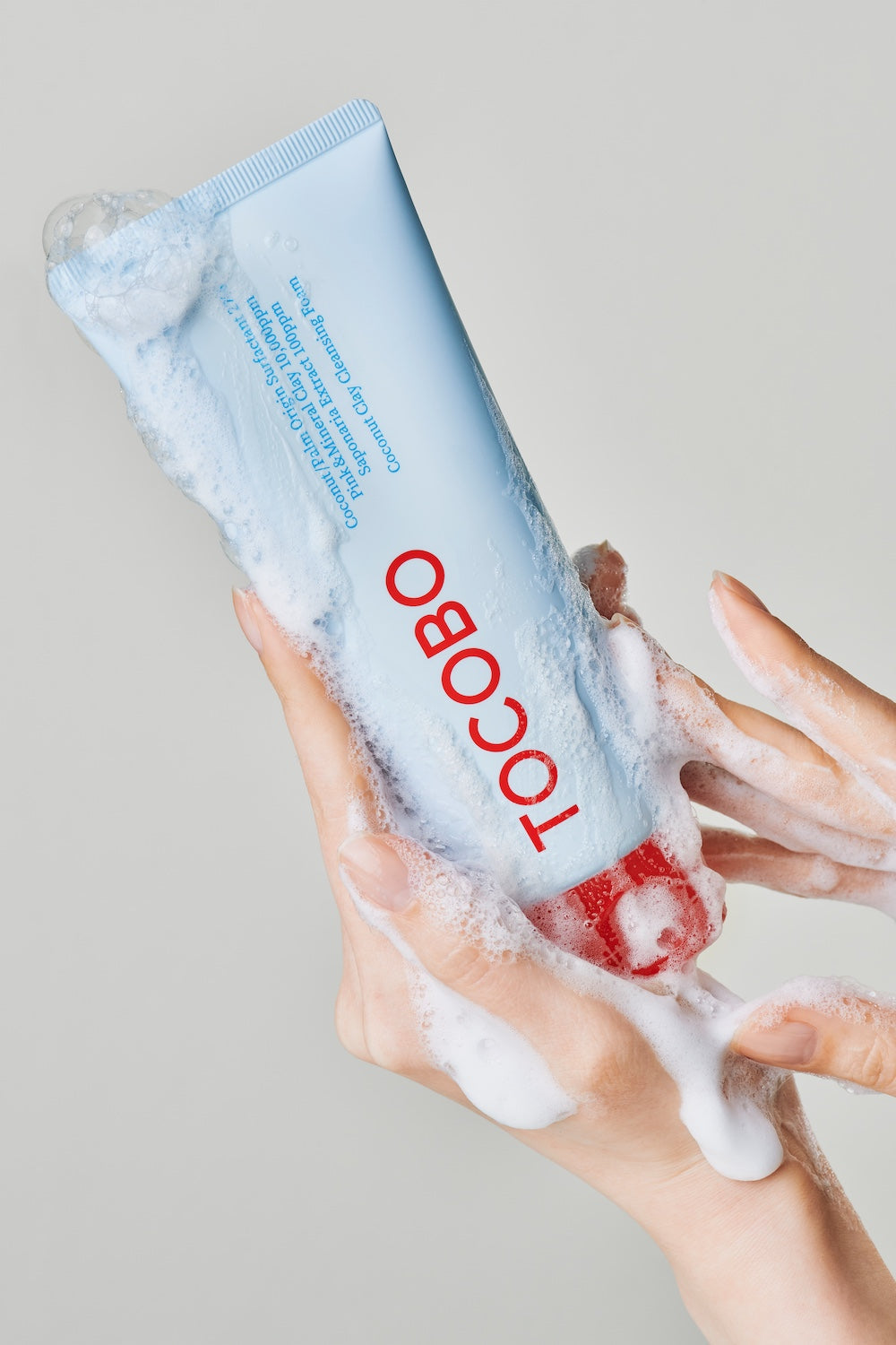 Cleansing foam tube next to other TOCOBO cleansers