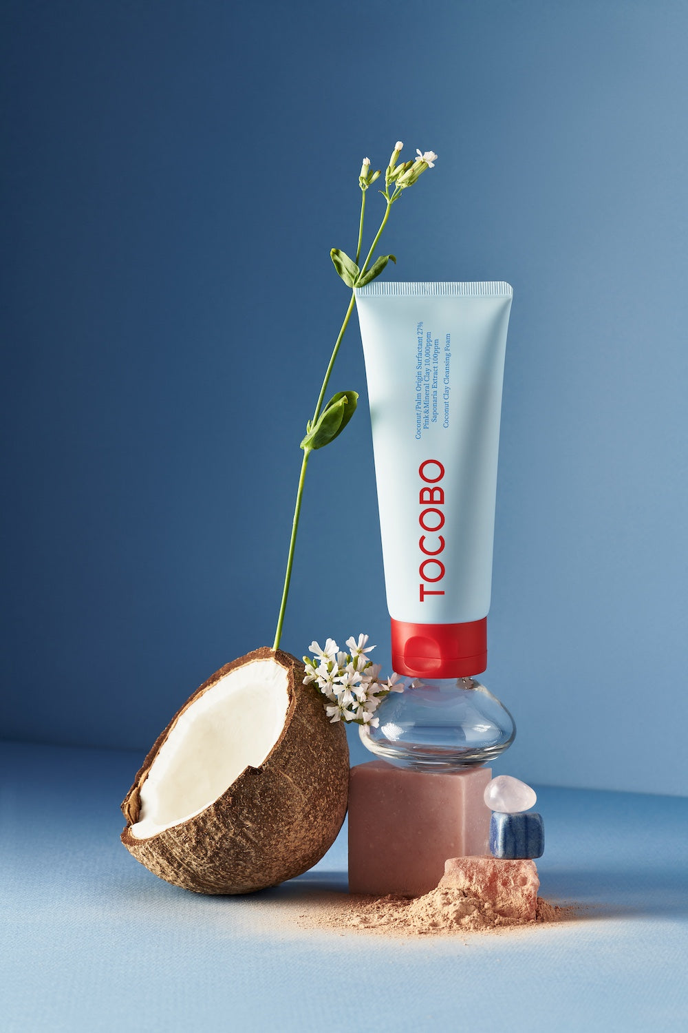 Cleansing foam tube photographed against neutral background