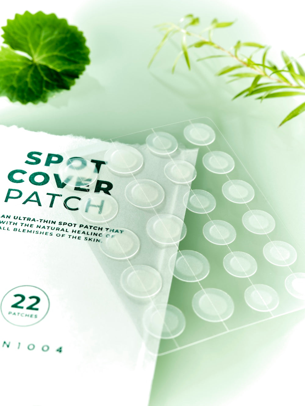Close-up of SKIN1004 logo on patch packaging