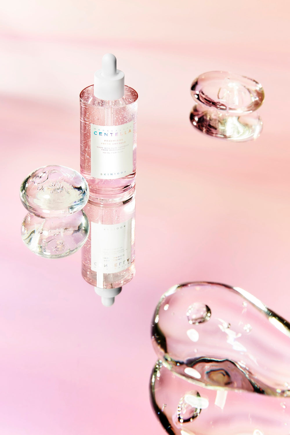Close-up of SKIN1004 logo on ampoule bottle