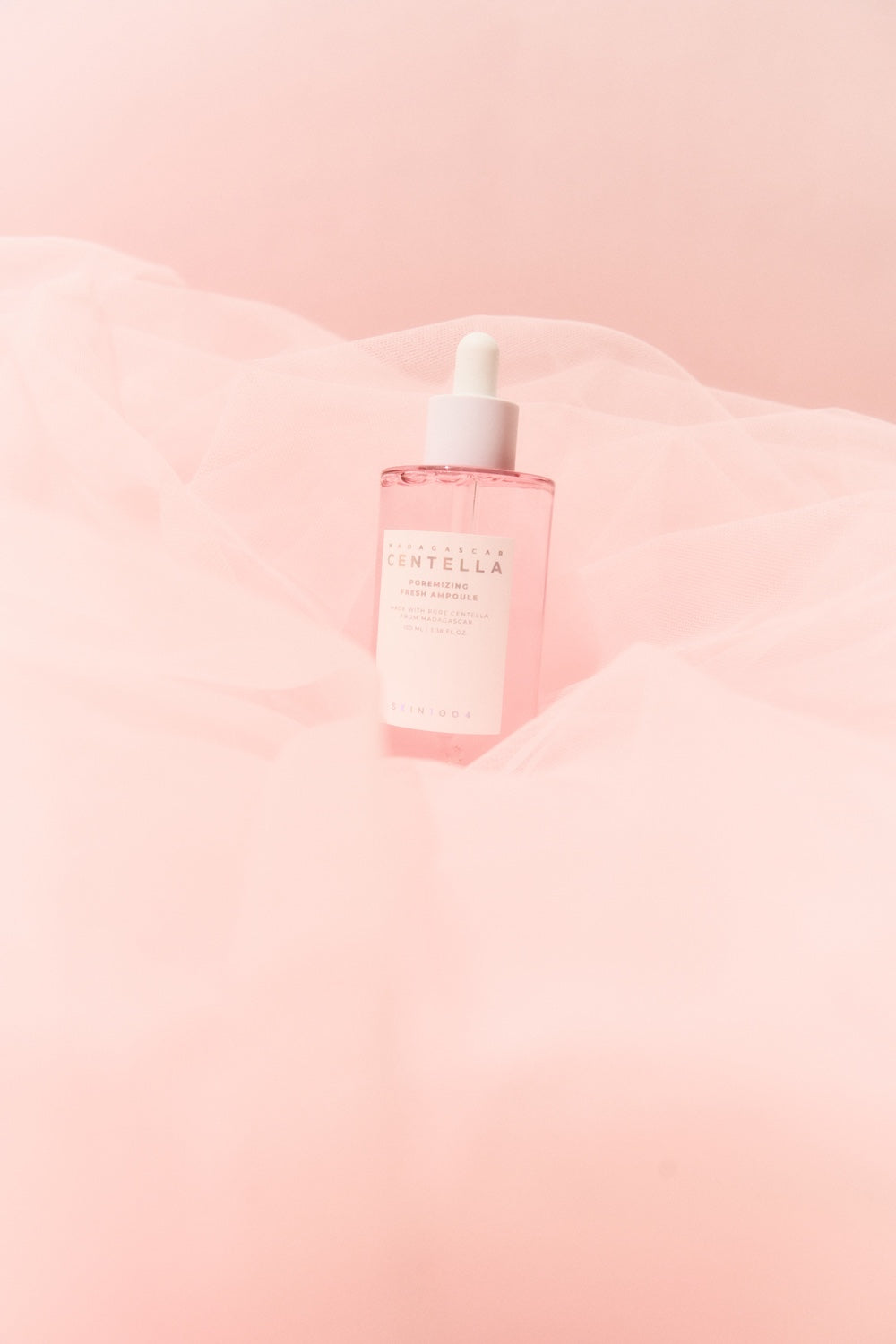 Ampoule bottle and box together on flat lay