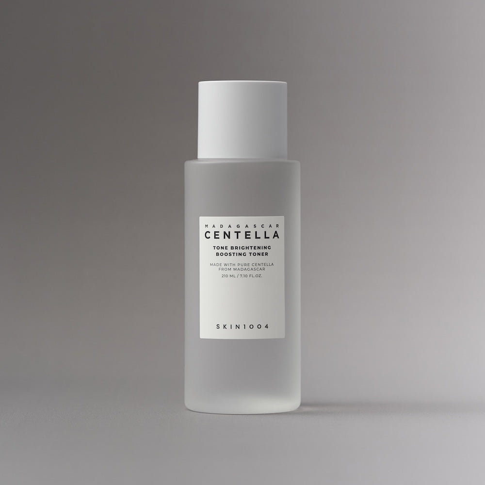 Toner bottle standing on bathroom counter