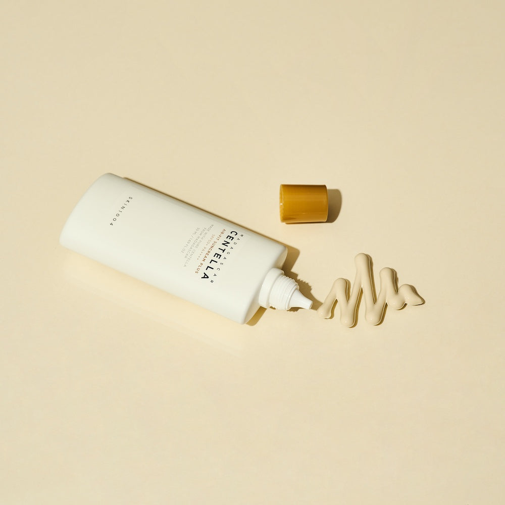 Close-up of pump mechanism on suncream bottle