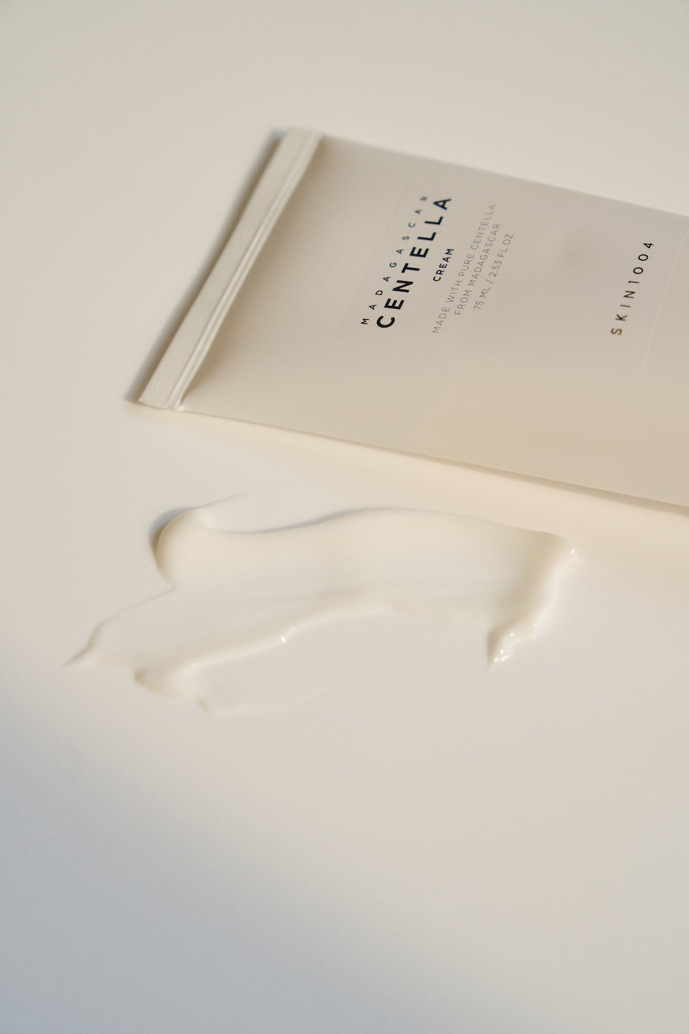 Side view of cream jar showing fill level