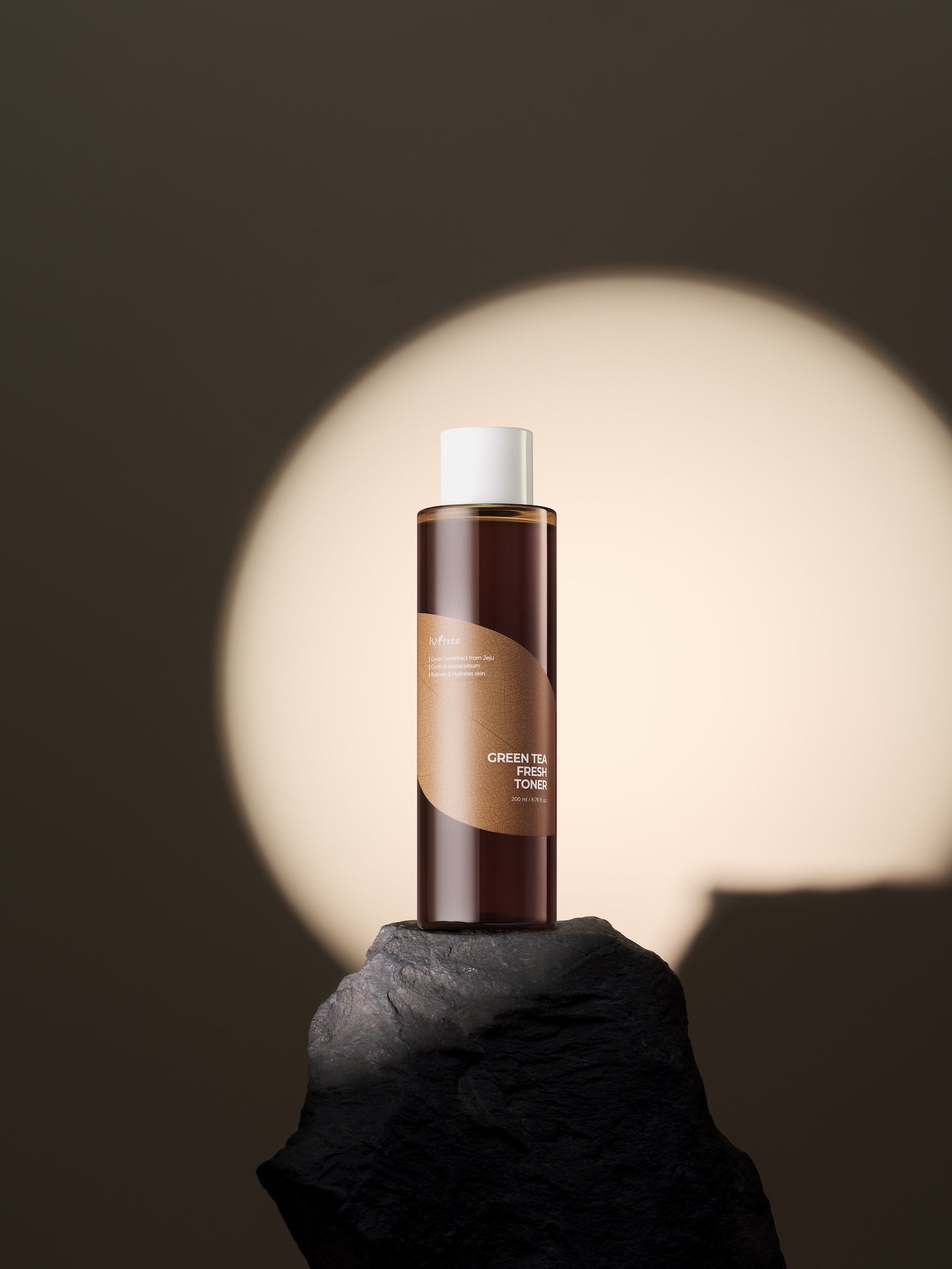 Model patting green tea toner into skin during morning routine