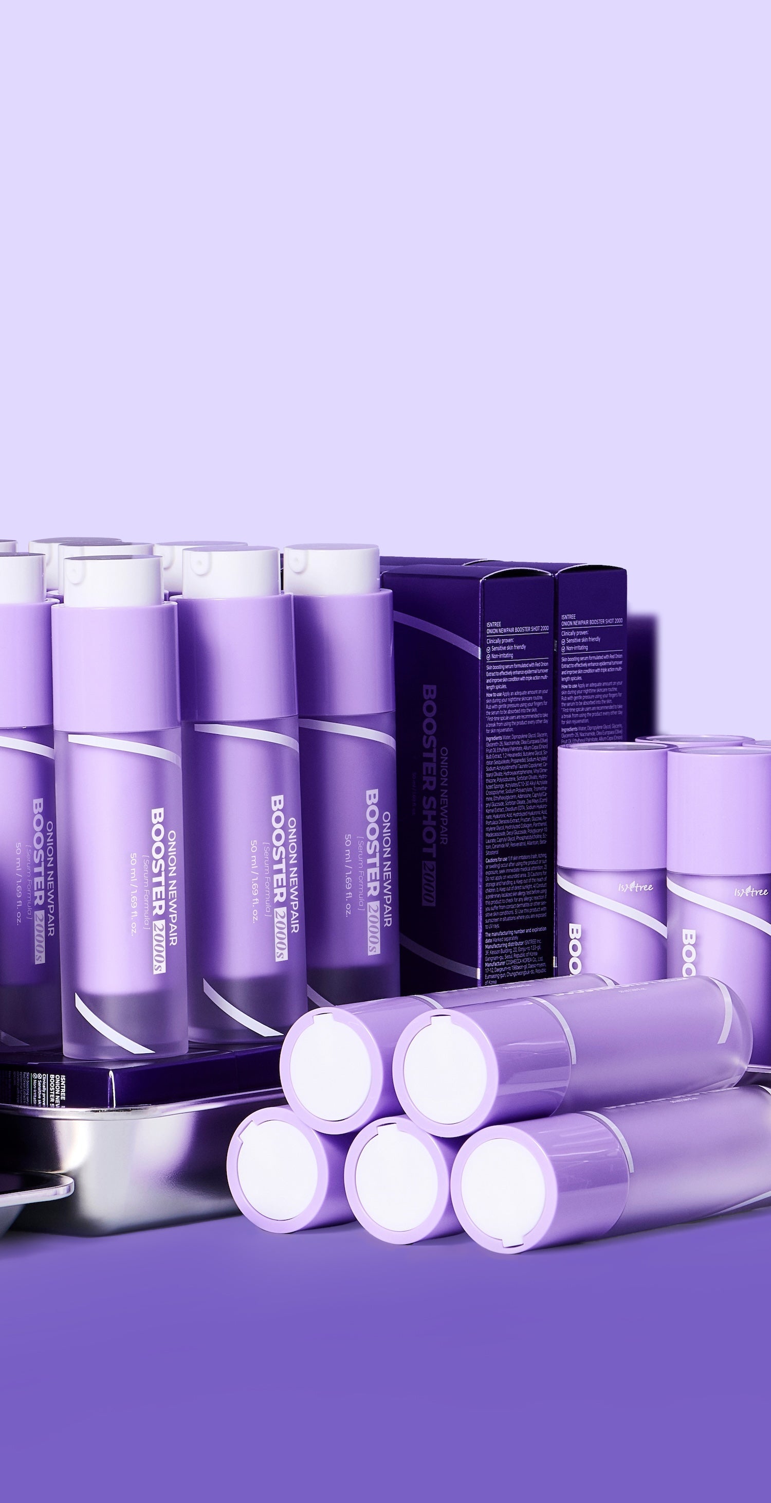 Model applying booster serum during nighttime routine