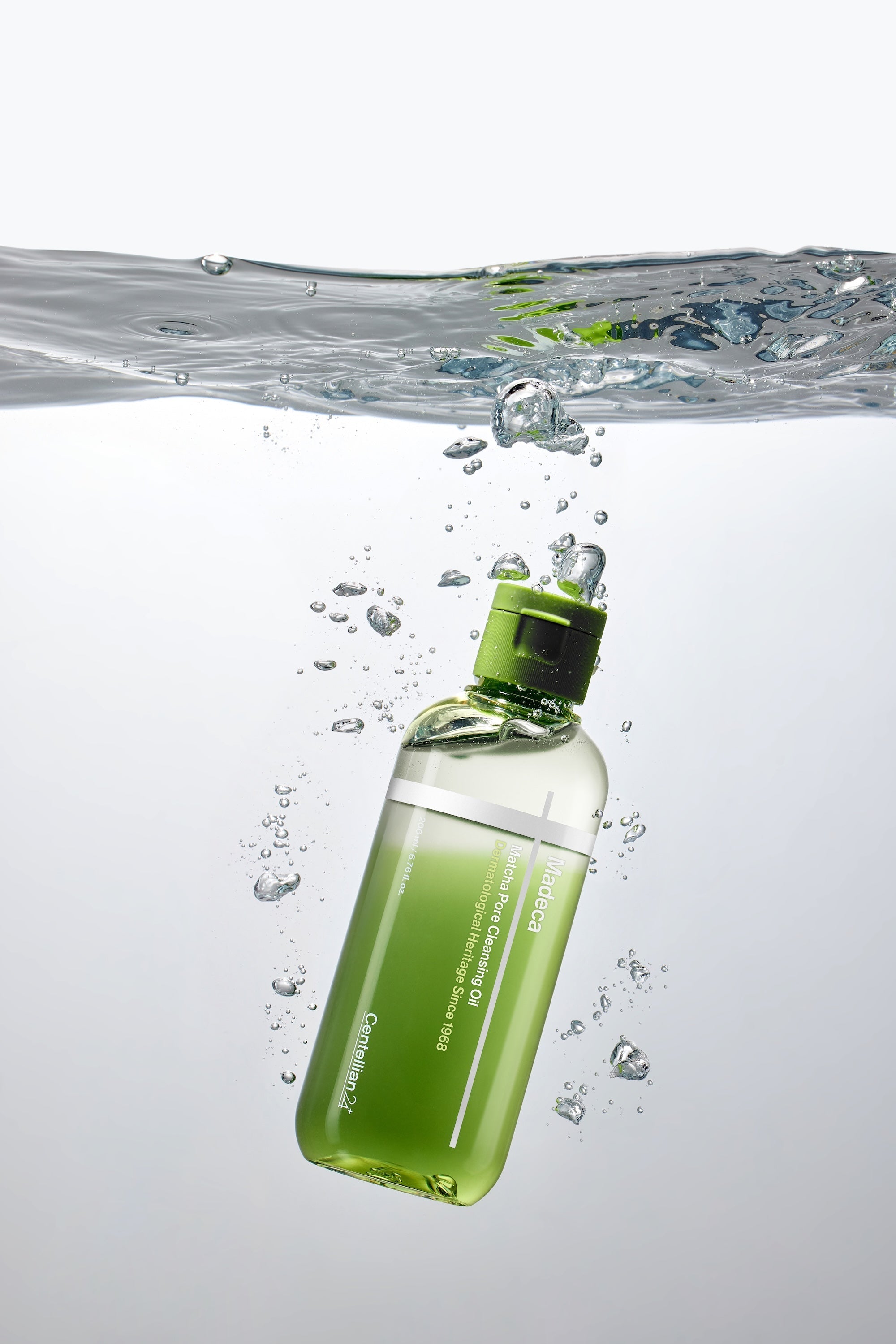 Centellian24 Matcha Pore Cleansing Oil rinsing off in sink