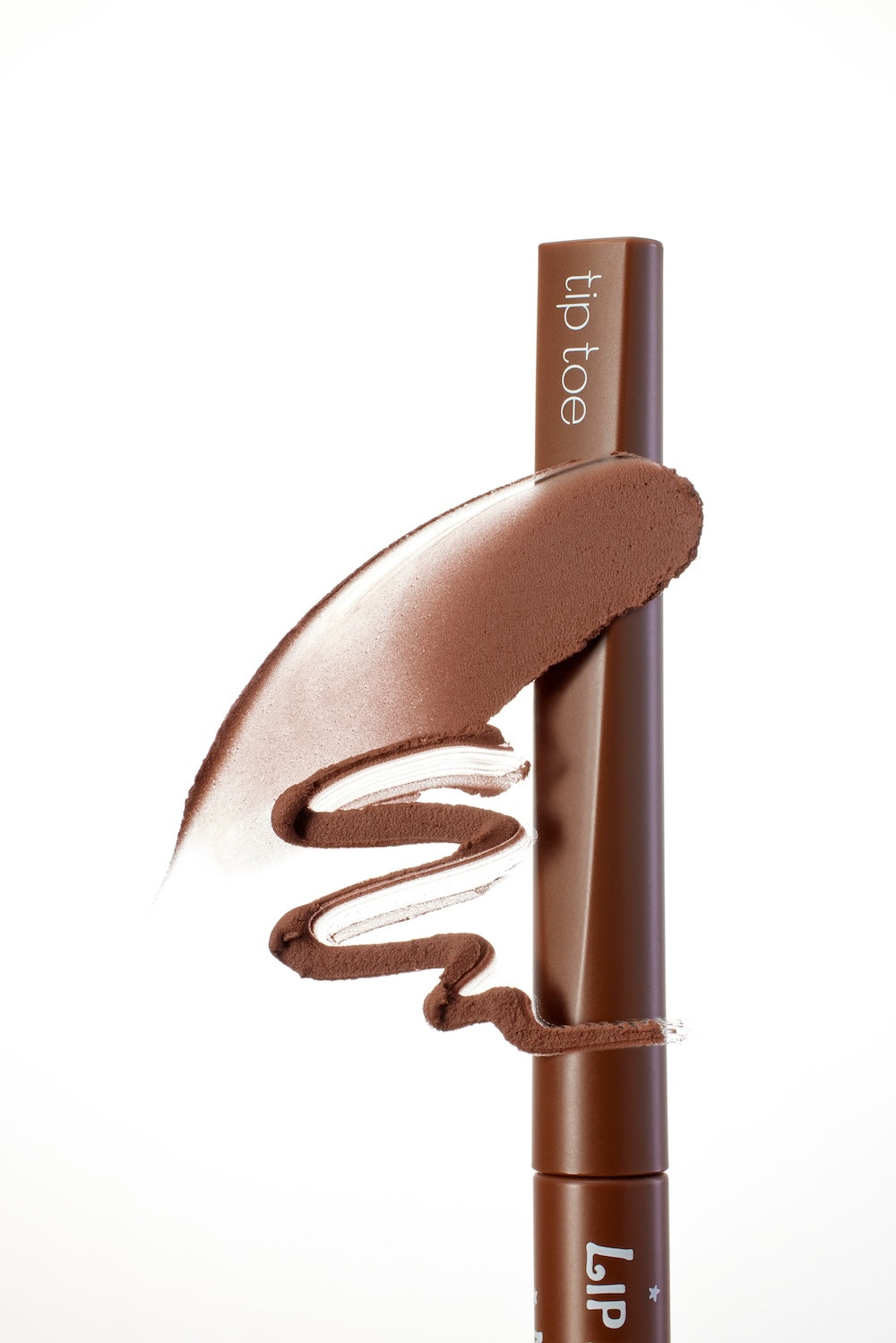 Slim precision tip of the Norwegian Wood lip tint applicator shown close up