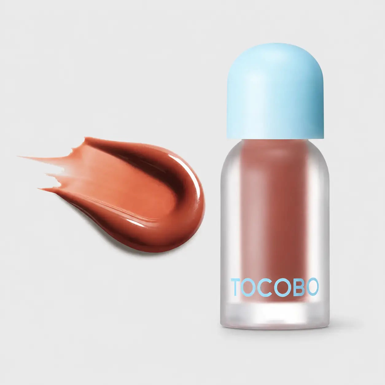 Tocobo Juicy Berry Plumping Lip Oil applied to lips