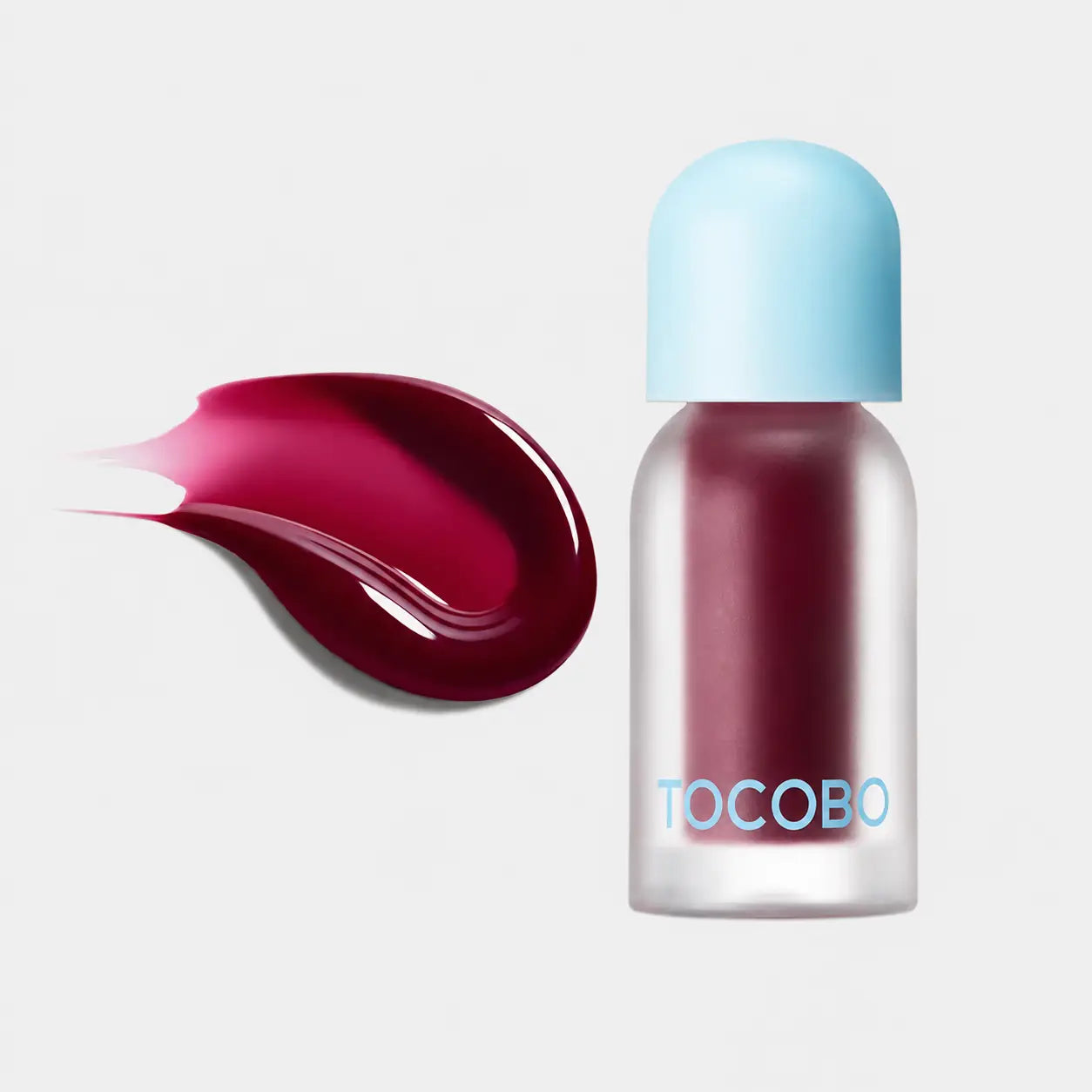 Tocobo Juicy Berry Plumping Lip Oil glass-lip finish close-up