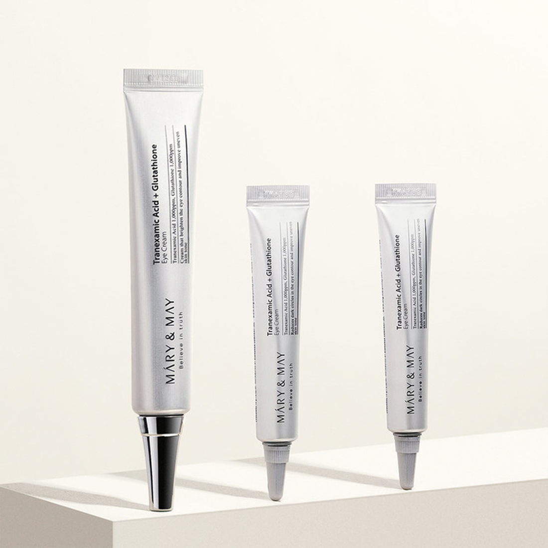 Small amount of eye cream dispensed onto fingertip