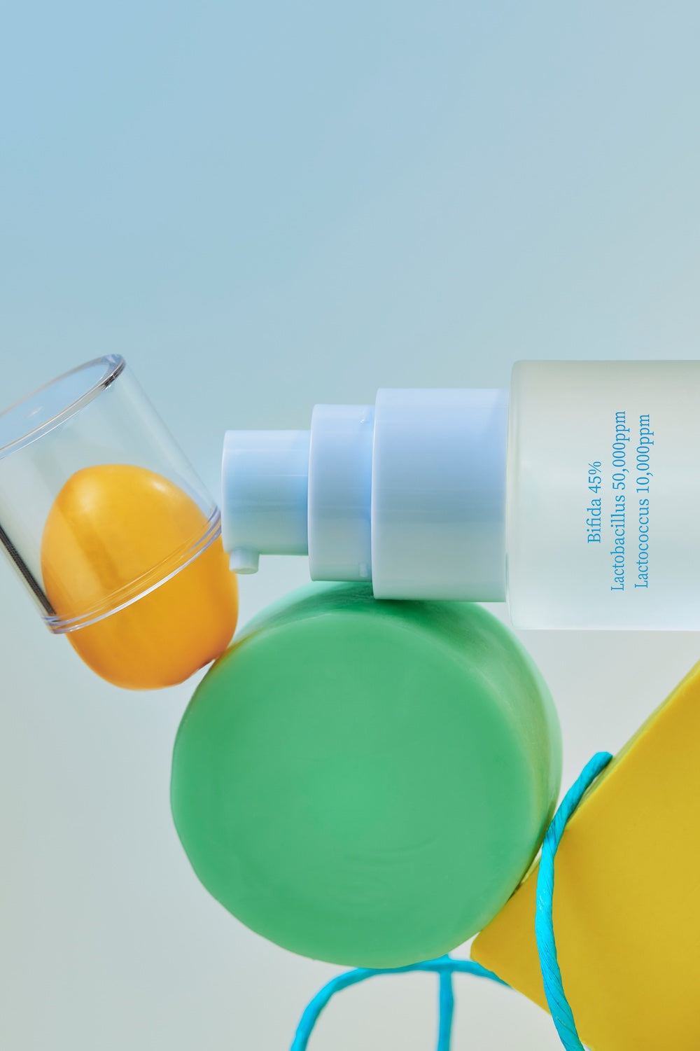 TOCOBO logo close-up on essence bottle