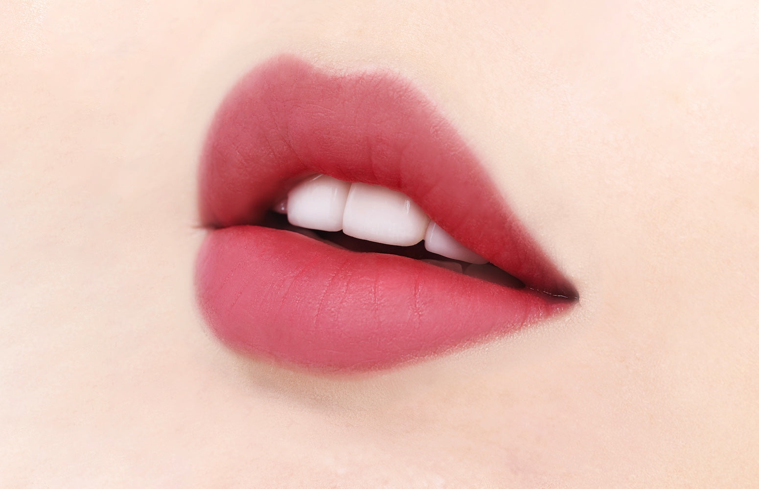 Lip balm tube standing upright on shelf