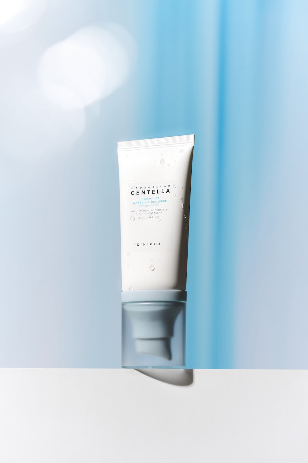 Sun serum box opened showing bottle inside