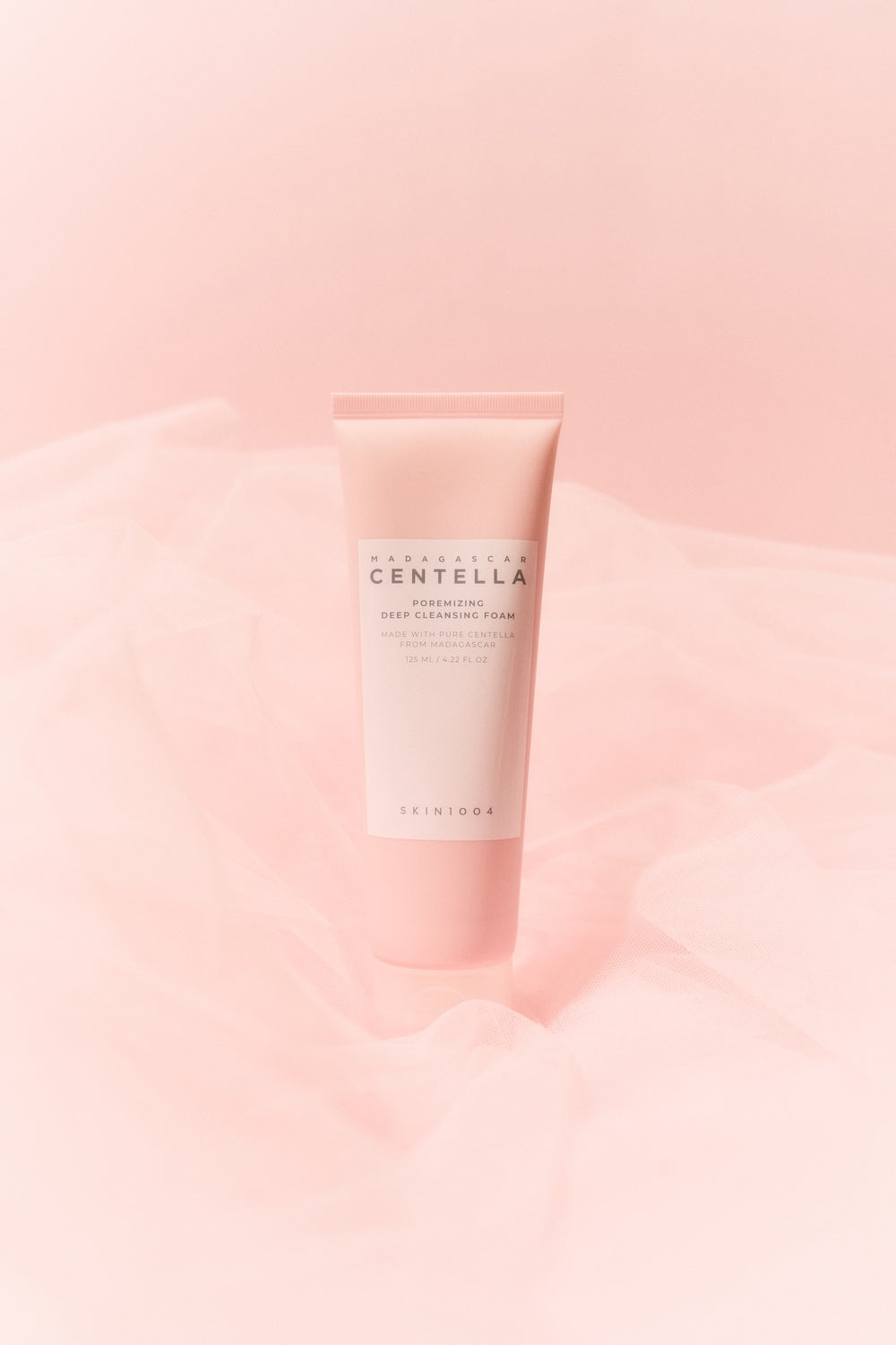 SKIN1004 Poremizing Deep Cleansing Foam shown at true size next to a coin for scale
