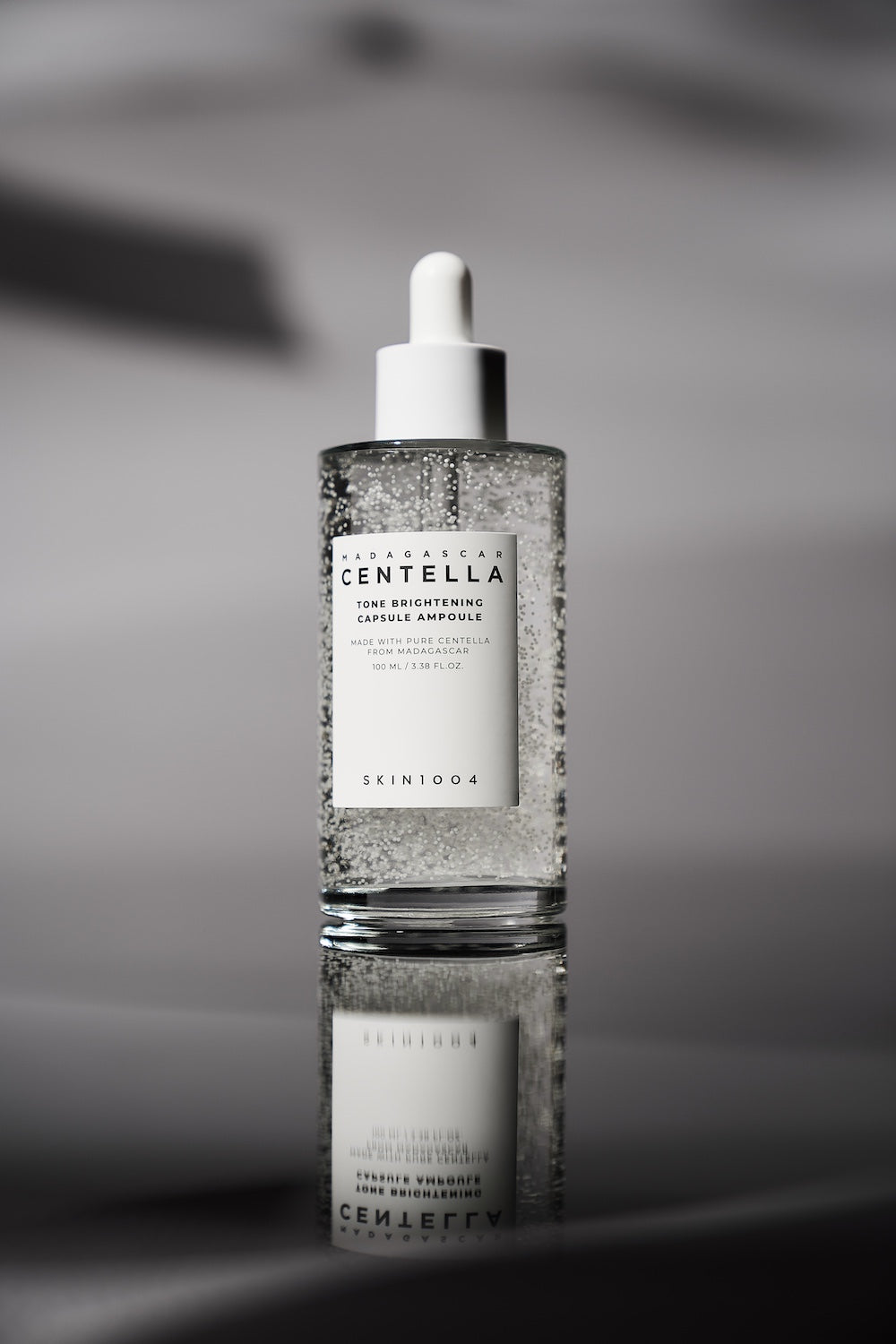 100ml ampoule bottle standing on shelf