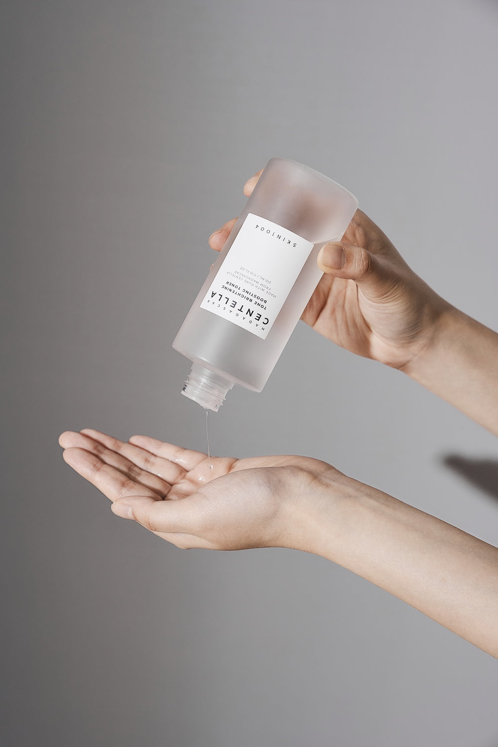 Toner applied to palm of hand