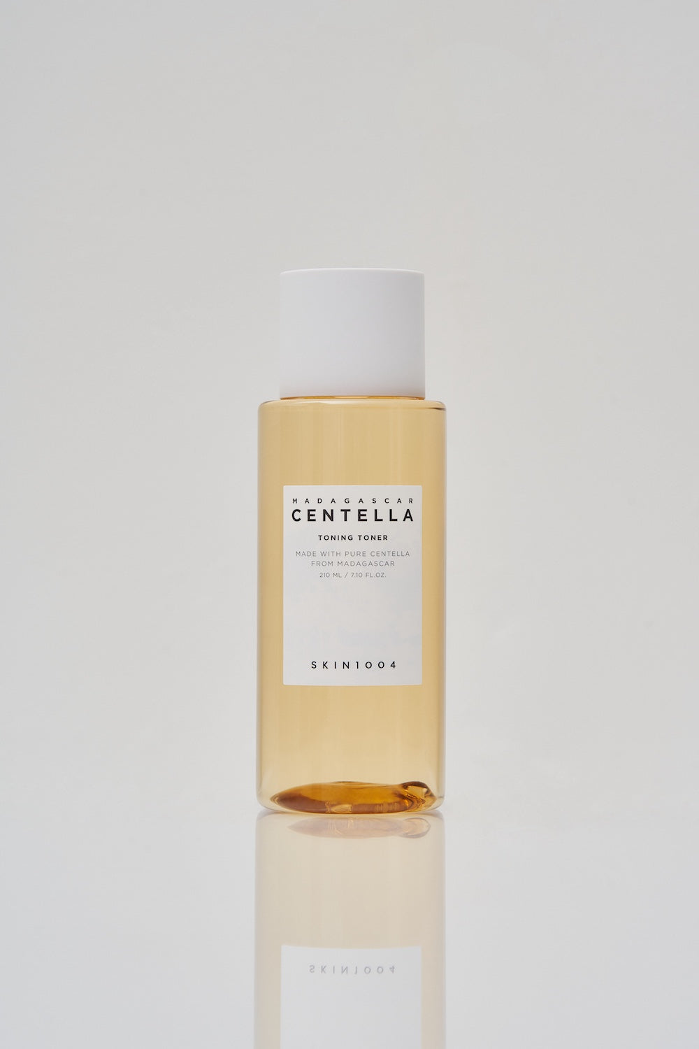Toning toner bottle and packaging box on shelf