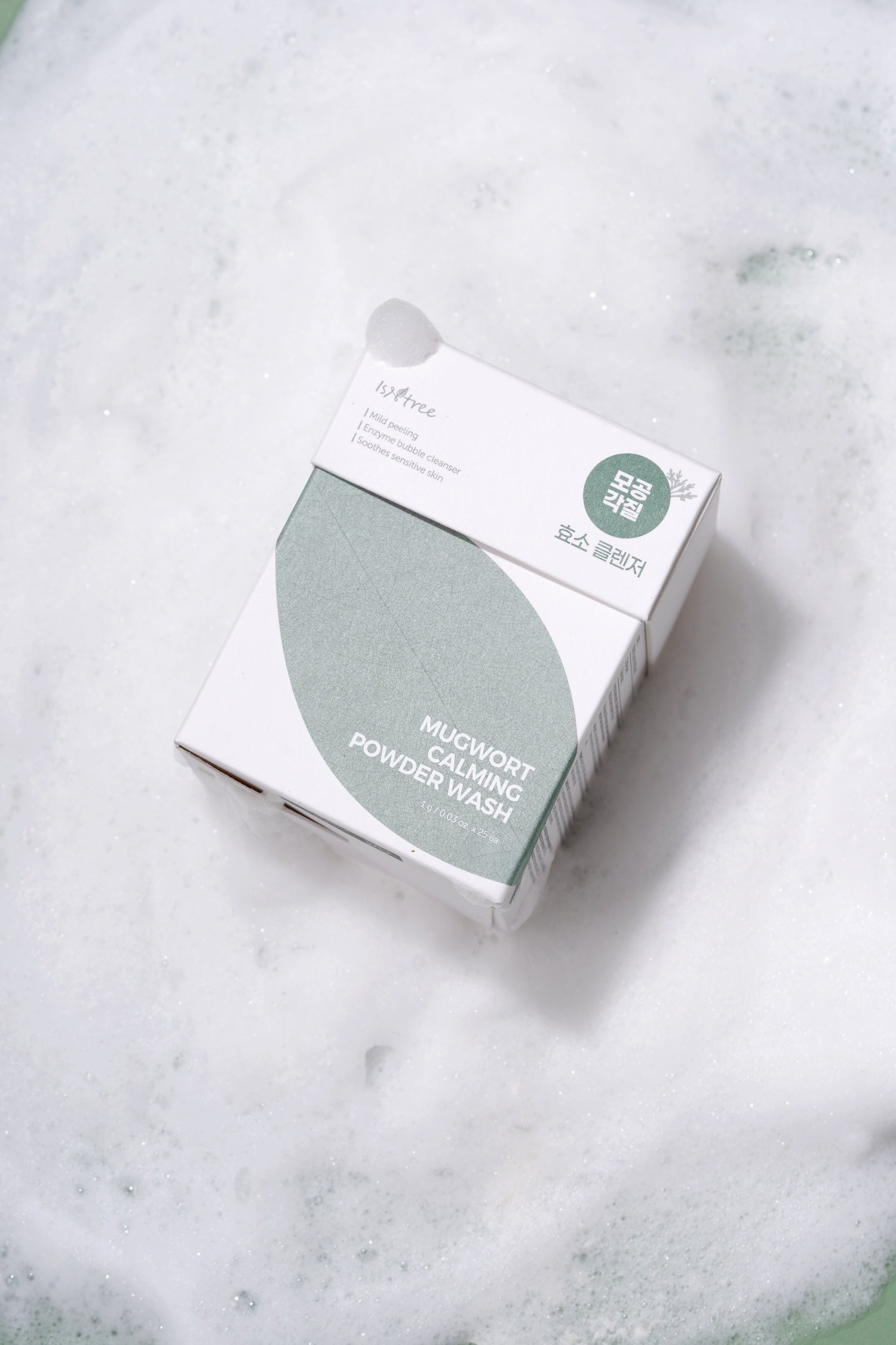 Isntree Mugwort Calming Powder Wash sachets fanned out on counter