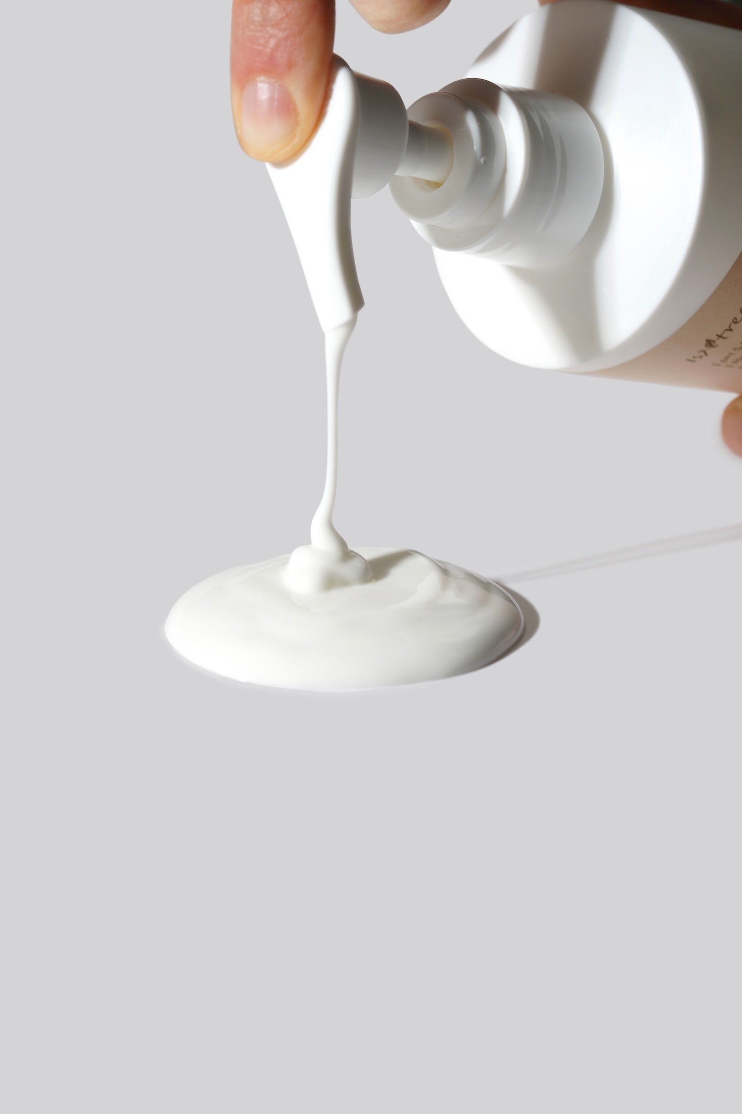 Isntree Yam Root Vegan Milk Cleanser emulsifying with water on skin