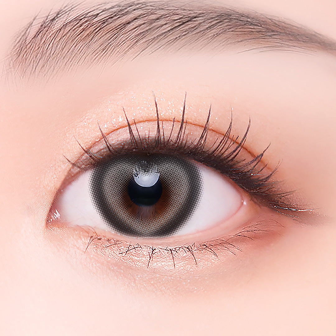 Cocoview Heart Ruri Gray lens shown against a light background