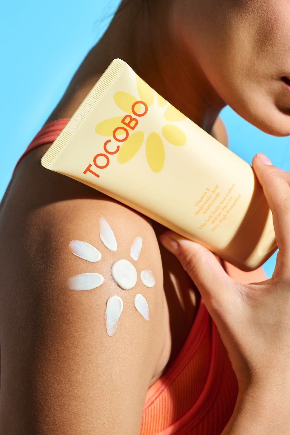 TOCOBO logo close-up on sun lotion bottle
