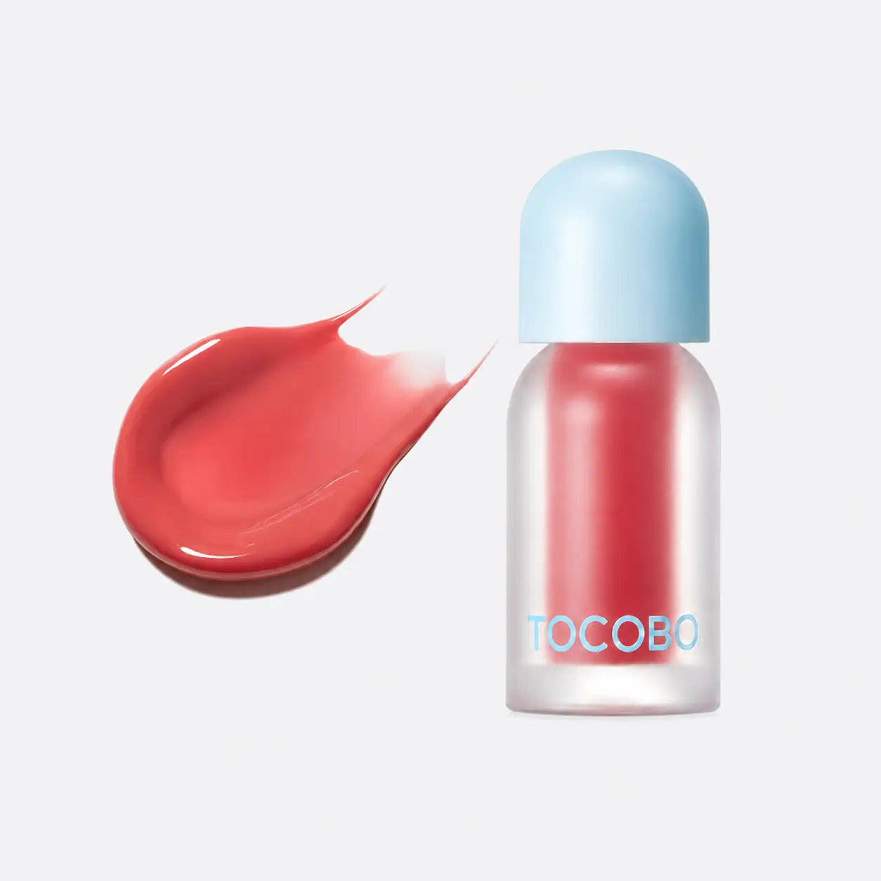 Tocobo Juicy Berry Plumping Lip Oil lifestyle flat lay