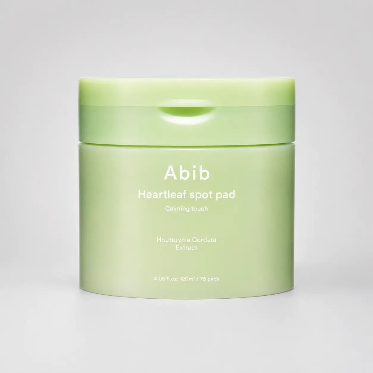 Abib Heartleaf Spot Pad Calming Touch jar shown upright against a plain background